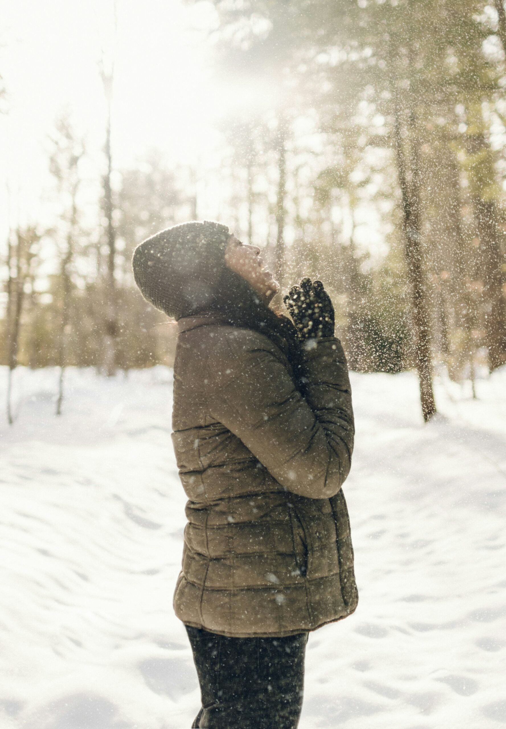 Happy woman in the snow